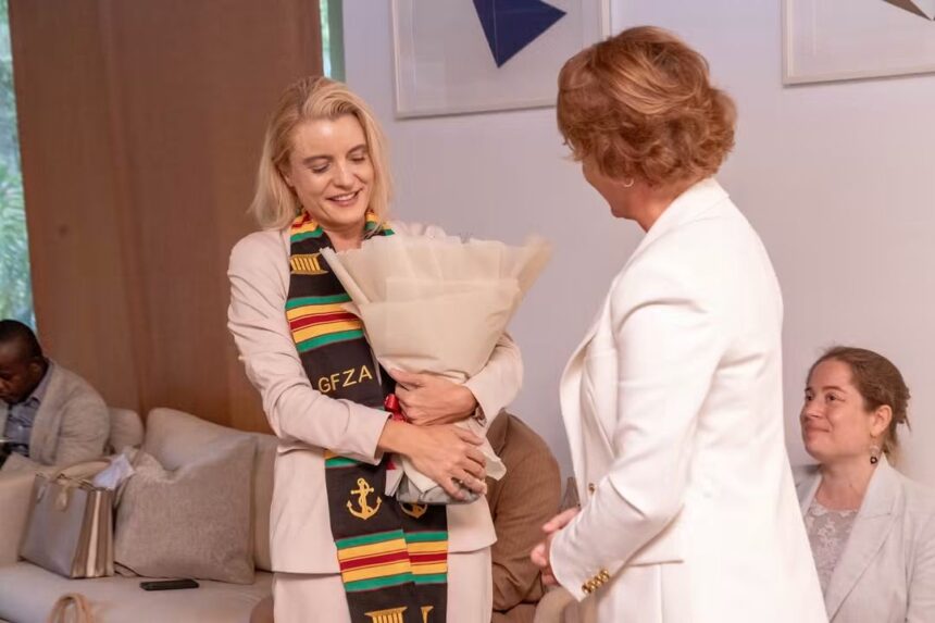 Ambassador Simone Giger-from Switzerland-with Bouquet.