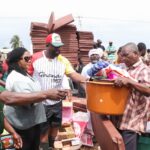 Gender Minister, Dr. Agness Naa Momo Lartey extends support to flood victims.