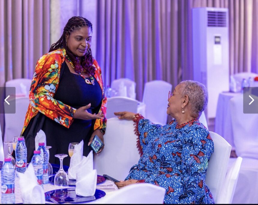 Vice President, Ghana Journalists Association (GJA), Rebecca Ekpe engaging Former Chamber of Mines CEO, Dr. Joyce Aryee.