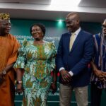 Professor Nana Jane Opoku Agyemang-Vice President of Ghana in green print with (from left), Minister of Local Government, Ahmed Ibrahim, Education Minister, Haruna Iddrisu and Executive Secretary, IMMCoD, Gameli Hoedofia (PhD), at the 2nd National Dialogue on Decentralization in Accra.