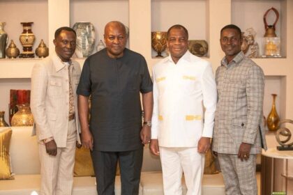 Rev Wengam in White , President Mahama in Black with other Church Officials.