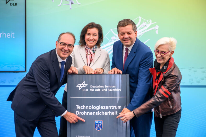 Alexander Dobrindt (L-R) German Minister of the Interior; Dorothee Baer, German Minister of Research, Technology, and Space; Sven Schulze, Minister-President of Saxony-Anhalt, and Anke Kaysser-Pyzalla, Chairwoman of the Executive Board of the German Aerospace Center (DLR), open the Technology Center for Drone Safety and unveil the commemorative plaque bearing the institution's name. The Technology Center for Drone Safety is located at the DLR site in the Cochstedt district. Photo: Klaus-Dietmar Gabbert/dpa
