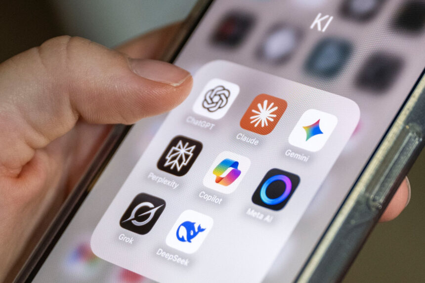 ILLUSTRATION - Several AI applications are visible on a smartphone screen, including ChatGPT, Claude, Gemini, Perplexity, Microsoft Copilot, Meta AI, Grok, and DeepSeek. Photo: Philip Dulian/dpa