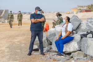Officials Stan Dogbey with Regional Minister, Madam Ohenewa Ocloo at the demolition site-Kpeshie Lagoon-Laboma.